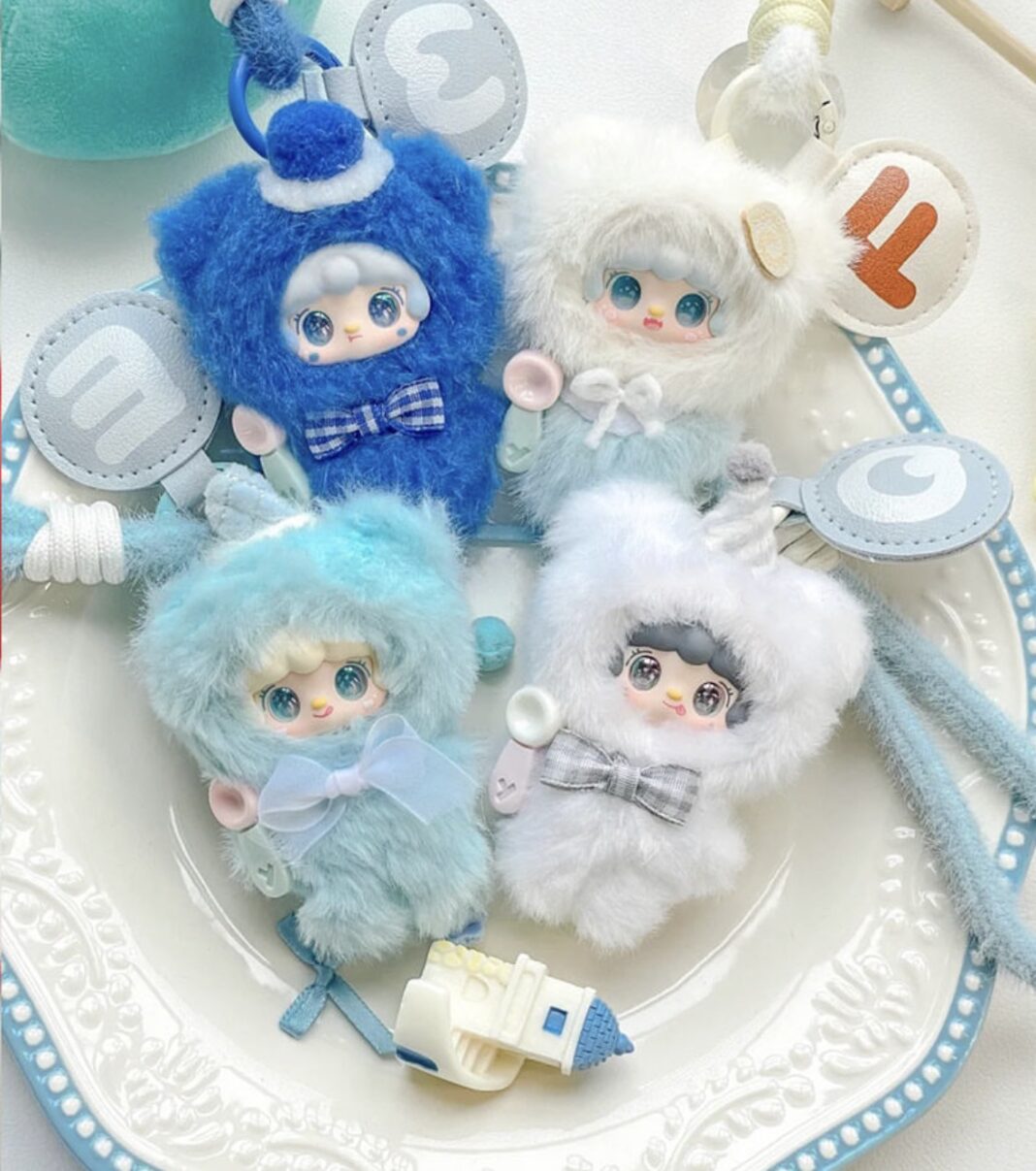 A close-up top-down photograph of four different pastel Yooki 